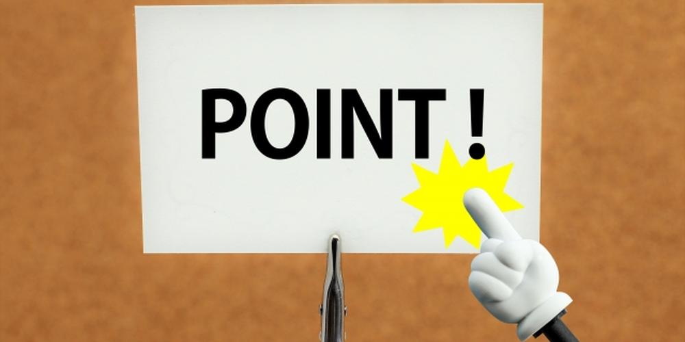 「“POINT！”と書かれたメッセージカードを指差す手のイラスト」