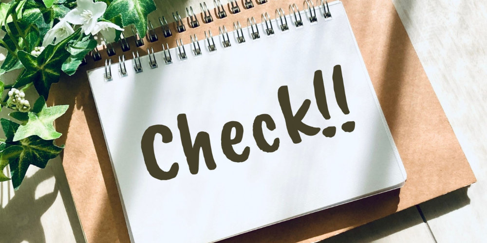 リングノートに大きく「Check!!」と手書き